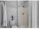 Bright bathroom featuring a walk-in shower and updated fixtures at 6749 Westlake Blvd, Orlando, FL 32810