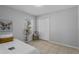 Neutral bedroom offering light walls, closet, decorative plant, and tile floors for a clean and welcoming feel at 6749 Westlake Blvd, Orlando, FL 32810