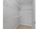 Organized walk-in closet with wire shelving for ample storage space at 6749 Westlake Blvd, Orlando, FL 32810