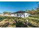 Expansive backyard featuring a new home in a serene, partially wooded setting at 7110 Sw 134Th St, Ocala, FL 34473