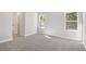 Bedroom with soft carpet, lots of natural light from two windows at 7110 Sw 134Th St, Ocala, FL 34473