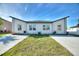 Beautiful single-Gathering home featuring a modern design, manicured lawn, and freshly poured driveway at 804 Colville Dr, Kissimmee, FL 34759