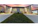 Charming single-Gathering home with a contemporary design, illuminated by warm sunset hues at 804 Colville Dr, Kissimmee, FL 34759