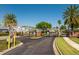 Gated community entrance with manicured landscaping at 819 Featherstone Ln, Lake Mary, FL 32746