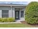Inviting front entrance with decorative glass door and manicured landscaping at 819 Featherstone Ln, Lake Mary, FL 32746