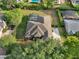 Aerial view of home showcasing its private pool, back yard and surrounding neighborhood at 859 Windcrest Pl, Winter Springs, FL 32708