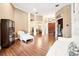 Spacious living room featuring elegant columns, wood floors, and a large entrance way at 859 Windcrest Pl, Winter Springs, FL 32708
