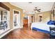 Spacious main bedroom featuring a ceiling fan, wood floors, and natural light at 859 Windcrest Pl, Winter Springs, FL 32708