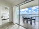 View from doorway onto balcony overlooking the water at 8743 S The Esplanade # 18, Orlando, FL 32836