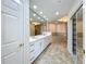 This luxury bathroom features a dual sink vanity, soaking tub, and walk-in shower at 8743 S The Esplanade # 18, Orlando, FL 32836