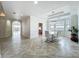 Dining room featuring chandelier, natural light, and view to open floor plan at 8743 S The Esplanade # 18, Orlando, FL 32836