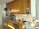 Bright kitchen featuring stainless steel appliances and granite countertops at 8743 S The Esplanade # 18, Orlando, FL 32836