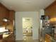 Well-equipped kitchen leading to a dining area, ideal for modern living at 8743 S The Esplanade # 18, Orlando, FL 32836