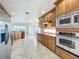 Bright open kitchen featuring stainless steel appliances and an abundance of cabinet space at 8743 S The Esplanade # 18, Orlando, FL 32836