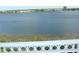 Scenic lake view from a balcony at 8743 S The Esplanade # 18, Orlando, FL 32836