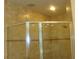 Shower with tile walls and glass doors at 8743 S The Esplanade # 18, Orlando, FL 32836