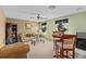 Comfortable living room with stylish furniture, ceiling fan, and natural light, for relaxed, everyday living at 920 Nola Dr, Ocoee, FL 34761