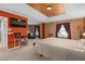 Expansive bedroom with television, large windows, and comfortable seating for ultimate relaxation and enjoyment at 920 Nola Dr, Ocoee, FL 34761