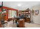 Comfortable home office featuring a wooden desk, hutch, and a neutral color palette at 920 Nola Dr, Ocoee, FL 34761