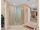 Modern bathroom with a glass-enclosed shower, neutral tiles, and ample space, providing a comfortable design at 920 Nola Dr, Ocoee, FL 34761