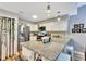 Modern kitchen with granite counters, stainless steel appliances, and pendant lighting over the island at 980 Mooring Ave # 105, Altamonte Springs, FL 32714