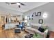 Inviting living room with an open layout to the kitchen, offering comfortable seating and stylish decor at 980 Mooring Ave # 105, Altamonte Springs, FL 32714
