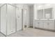 A bright and airy bathroom with a large glass shower and double vanity at 4532 Windy Oak Way, St Cloud, FL 34772