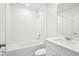 Fresh bathroom with a bathtub, shower, vanity, and clean design featuring neutral tiling and modern fixtures at 4532 Windy Oak Way, St Cloud, FL 34772