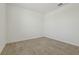 Empty bedroom with gray-toned tiled flooring, white walls, and bright overhead light at 4532 Windy Oak Way, St Cloud, FL 34772