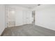 Comfortable bedroom with soft carpet and neutral walls leads to bathroom and closet at 4532 Windy Oak Way, St Cloud, FL 34772