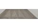 Close-up of plush, neutral-toned carpeting with pristine white baseboards at 4532 Windy Oak Way, St Cloud, FL 34772
