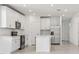 Modern kitchen featuring stainless steel appliances, island and an open floor plan at 4532 Windy Oak Way, St Cloud, FL 34772