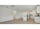 An open-concept kitchen and living area with modern appliances and sleek design at 4532 Windy Oak Way, St Cloud, FL 34772