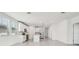 Modern kitchen with white cabinets, stainless steel appliances, and center island with sink at 4532 Windy Oak Way, St Cloud, FL 34772