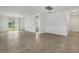Bright living room features tile flooring and sliding glass door to backyard at 4532 Windy Oak Way, St Cloud, FL 34772