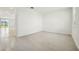 Spacious living room showcases tiled floors, natural light, and open layout for flexible furniture arrangement at 4532 Windy Oak Way, St Cloud, FL 34772