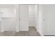 Spacious walk-in closet with open shelving provides ample storage solutions and easy organization at 4532 Windy Oak Way, St Cloud, FL 34772