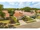 Single-story home in quiet neighborhood offers mature landscaping and a paver driveway at 618 Via Milano, Apopka, FL 32712