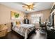 Cozy bedroom with hardwood floors and natural light at 618 Via Milano, Apopka, FL 32712