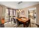 Dining room features a modern light fixture and a large window at 618 Via Milano, Apopka, FL 32712