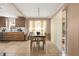 Bright dining room features tile flooring, modern lighting and sliding doors to outside at 618 Via Milano, Apopka, FL 32712