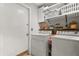 Functional laundry room with washer and dryer at 618 Via Milano, Apopka, FL 32712