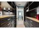 Walk-in closet with ample built-in shelving, drawers, and hanging space, offering organized storage solutions at 7849 Georgeann St, Winter Park, FL 32792