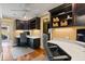 Functional home office with built-in desks, shelves, and natural light at 7849 Georgeann St, Winter Park, FL 32792