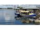 Charming waterfront area with boats, and dockside buildings, perfect for leisure and dining at 840 Cortez Ave, The Villages, FL 32159