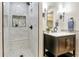 Modern bathroom featuring a tiled shower with seating and updated vanity with marble countertop at 1011 Terry Dr, Altamonte Springs, FL 32714