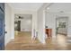 Inviting foyer with wood floors, open sightlines to dining and living areas create a spacious feel at 1011 Terry Dr, Altamonte Springs, FL 32714