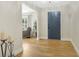 Bright foyer featuring lovely wood floors, fresh paint, and a welcoming atmosphere for visitors and residents at 1011 Terry Dr, Altamonte Springs, FL 32714