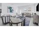 Bright living room featuring tile floors, modern furnishings and an open layout perfect for entertaining at 10151 Salt Point Dr, Winter Garden, FL 34787