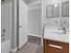 Full bath with wooden vanity and shower/tub at 1028 Marietta Ln, Eustis, FL 32726